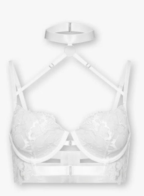 White strappy lace bra on a white background